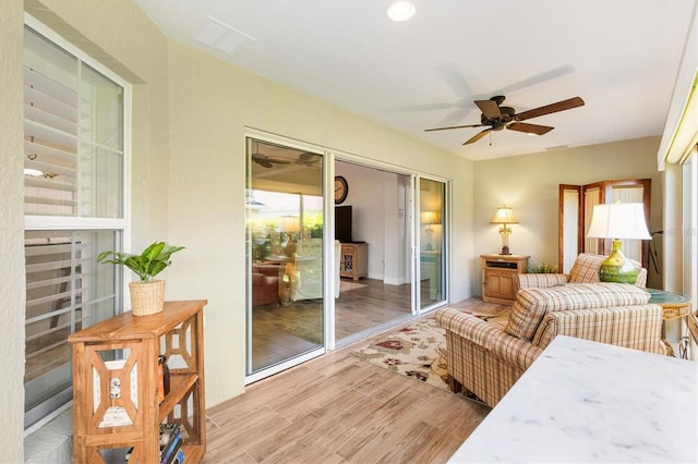 1182 Allaire Loop, The Villages, FL 32163 - bedroom featuring light wood-type flooring and a ceiling fan