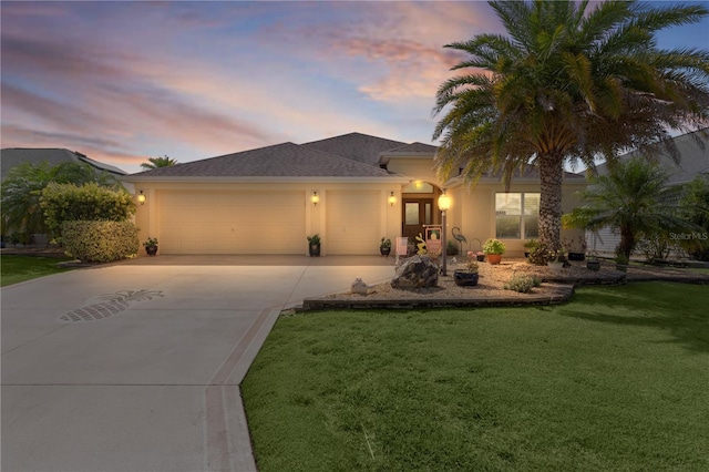 3433 Nestlebranch Ave, The Villages, FL 32163 - view of front of property with concrete driveway, an attached garage, a front yard, and stucco siding