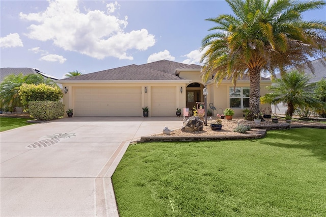 3433 Nestlebranch Ave, The Villages, FL 32163 - view of front of house featuring stucco siding, driveway, a front lawn, and a garage