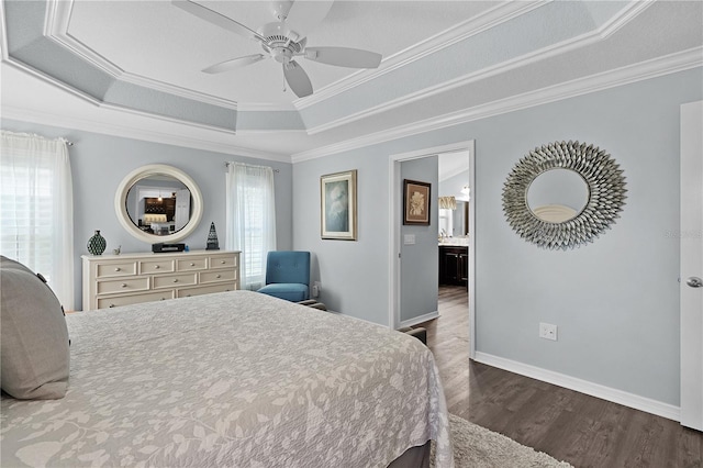 3433 Nestlebranch Ave, The Villages, FL 32163 - bedroom with baseboards, ornamental molding, a tray ceiling, and dark wood-style floors