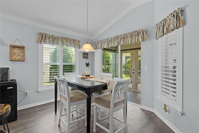 3433 Nestlebranch Ave, The Villages, FL 32163 - dining area with baseboards, ornamental molding, vaulted ceiling, and dark wood-style floors
