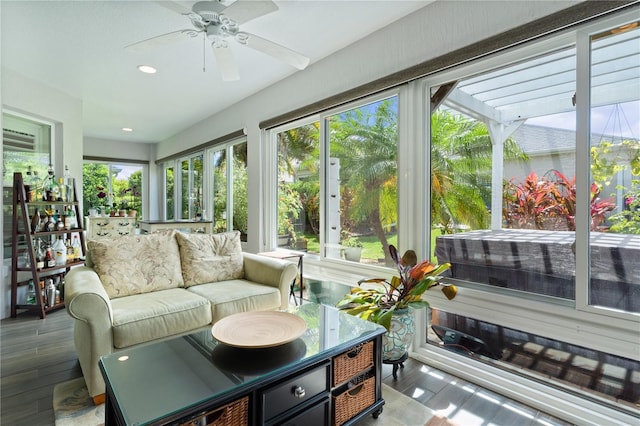 3433 Nestlebranch Ave, The Villages, FL 32163 - sunroom / solarium with recessed lighting, a ceiling fan, wood finished floors, and outdoor lounge area