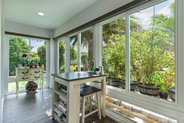 3433 Nestlebranch Ave, The Villages, FL 32163 - sunroom with recessed lighting, a wealth of natural light, and hardwood / wood-style flooring