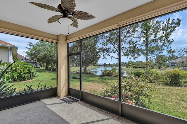 8167 Bridgeport Bay Cir, Mount Dora, FL 32757 - unfurnished sunroom with a water view and a ceiling fan