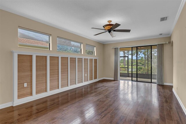 8167 Bridgeport Bay Cir, Mount Dora, FL 32757 - spare room featuring ornamental molding, a ceiling fan, hardwood / wood-style floors, and baseboards