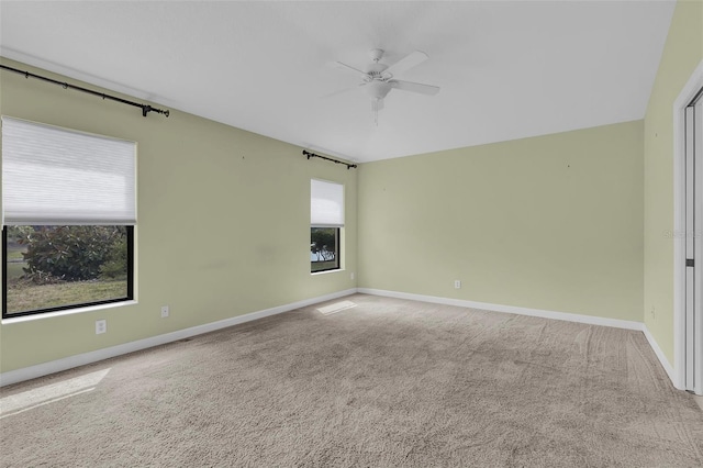 8167 Bridgeport Bay Cir, Mount Dora, FL 32757 - spare room featuring ceiling fan, carpet, and baseboards