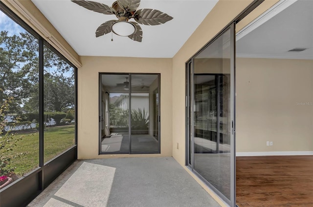 8167 Bridgeport Bay Cir, Mount Dora, FL 32757 - unfurnished sunroom featuring ceiling fan