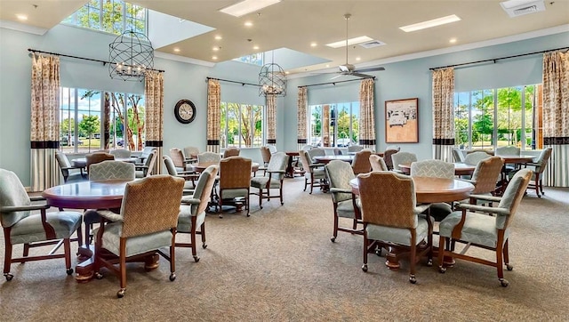 8167 Bridgeport Bay Cir, Mount Dora, FL 32757 - carpeted dining room featuring a chandelier, crown molding, and recessed lighting