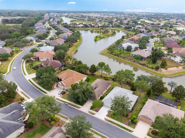 8167 Bridgeport Bay Cir, Mount Dora, FL 32757 - aerial overview of property's location featuring a large body of water and nearby suburban area