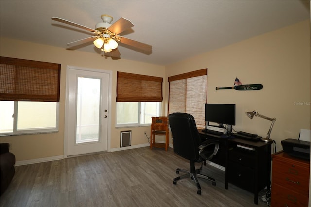 1482 Azteca Loop, The Villages, FL 32162 - office with baseboards, ceiling fan, and wood finished floors
