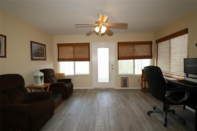 1482 Azteca Loop, The Villages, FL 32162 - home office with a wealth of natural light, baseboards, wood finished floors, and a ceiling fan
