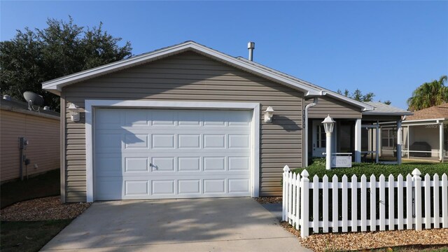 1070 Pinewood Pl, The Villages, FL 32162 - ranch-style home with driveway, fence, and an attached garage