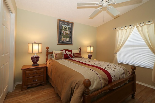 1070 Pinewood Pl, The Villages, FL 32162 - bedroom with light wood-style flooring, baseboards, and ceiling fan