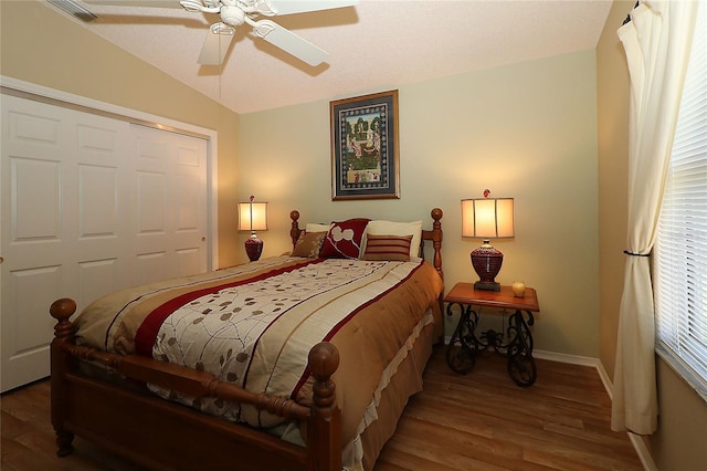 1070 Pinewood Pl, The Villages, FL 32162 - bedroom with wood finished floors, baseboards, a ceiling fan, a closet, and lofted ceiling