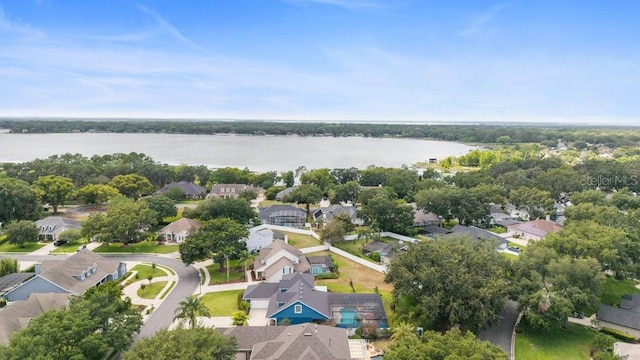 bird's eye view with a water view and a residential view