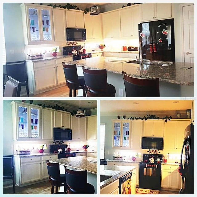 1231 Merion Dr, Mount Dora, FL 32757 - kitchen with black appliances, a center island, a breakfast bar area, and light stone counters