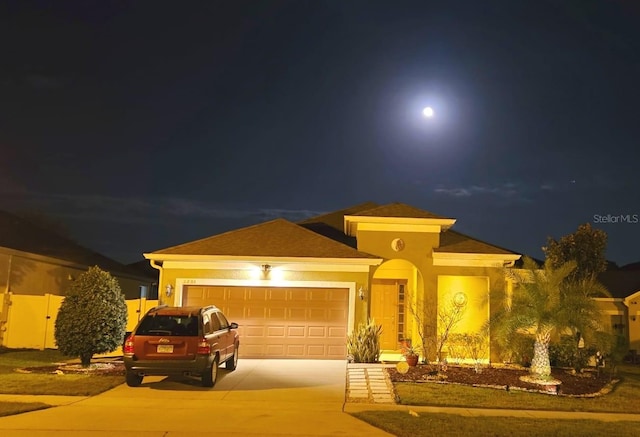 1231 Merion Dr, Mount Dora, FL 32757 - ranch-style home featuring driveway, an attached garage, and stucco siding