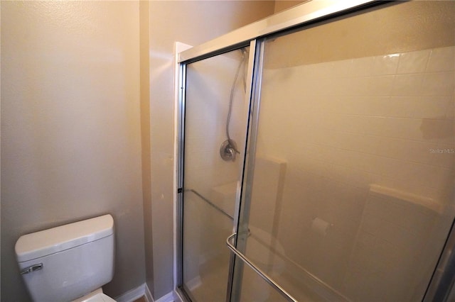 3329 White Blossom Ln, Clermont, FL 34711 - bathroom with a stall shower and toilet