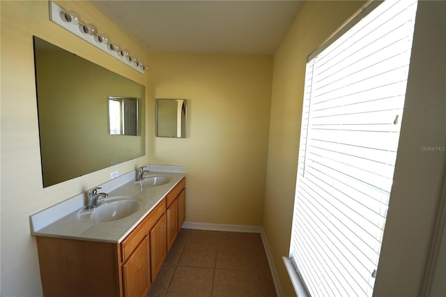 3329 White Blossom Ln, Clermont, FL 34711 - full bath featuring double vanity, tile patterned floors, and baseboards