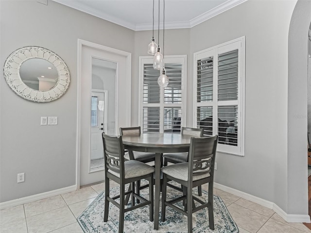 17471 SE 110th Ter, Summerfield, FL 34491 - dining room with arched walkways, ornamental molding, baseboards, and light tile patterned flooring