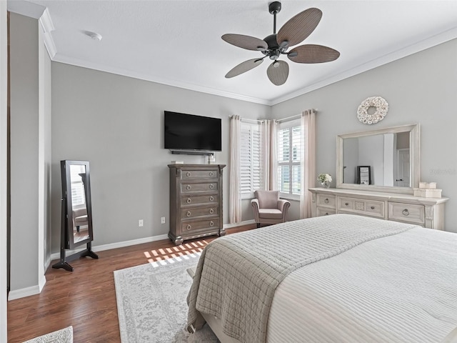 17471 SE 110th Ter, Summerfield, FL 34491 - bedroom with crown molding, dark wood-type flooring, baseboards, and ceiling fan
