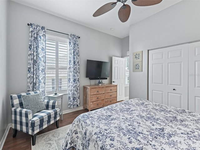 17471 SE 110th Ter, Summerfield, FL 34491 - bedroom featuring wood finished floors, a closet, baseboards, and a ceiling fan