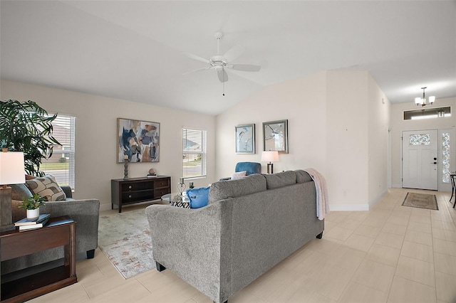 892 Hubbard Loop, The Villages, FL 32163 - living area with ceiling fan, vaulted ceiling, baseboards, and a chandelier