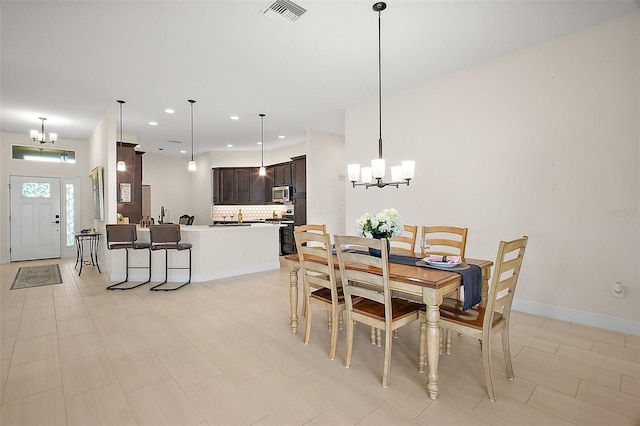 892 Hubbard Loop, The Villages, FL 32163 - dining space with a chandelier and recessed lighting