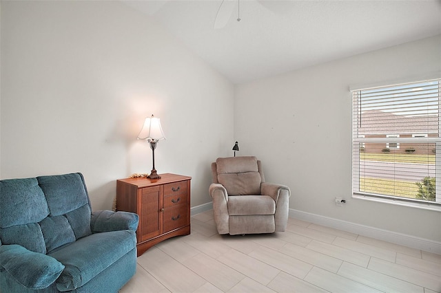 892 Hubbard Loop, The Villages, FL 32163 - sitting room with vaulted ceiling, baseboards, and a ceiling fan