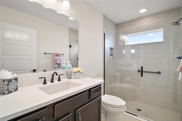 892 Hubbard Loop, The Villages, FL 32163 - bathroom featuring a stall shower, vanity, toilet, and recessed lighting