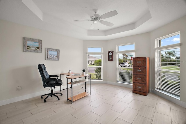 892 Hubbard Loop, The Villages, FL 32163 - home office with a raised ceiling, baseboards, and ceiling fan