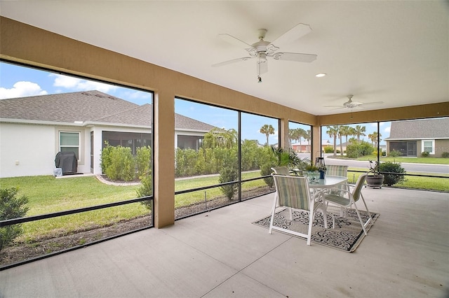 892 Hubbard Loop, The Villages, FL 32163 - sunroom / solarium featuring ceiling fan and outdoor dining space