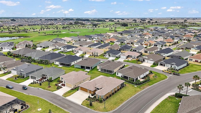 892 Hubbard Loop, The Villages, FL 32163 - aerial perspective of suburban area with a nearby body of water and a golf course