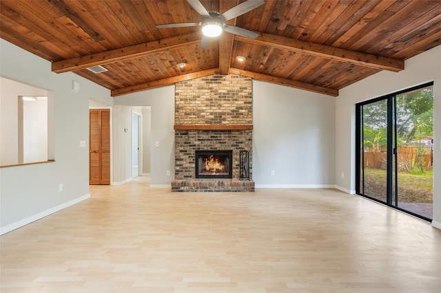 8410 Lake Bosse Dr, Orlando, FL 32810 - unfurnished living room with light wood-style flooring, a ceiling fan, baseboards, a fireplace, and wooden ceiling