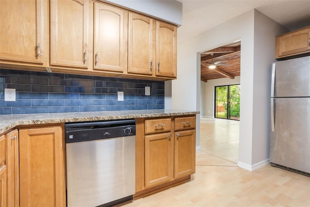 8410 Lake Bosse Dr, Orlando, FL 32810 - kitchen featuring stainless steel appliances, tasteful backsplash, baseboards, light stone countertops, and light flooring