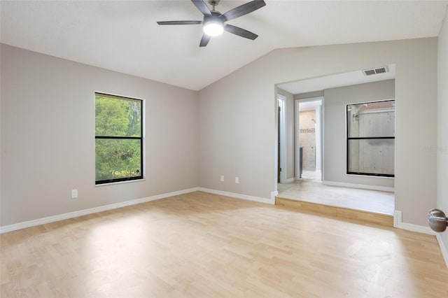 8410 Lake Bosse Dr, Orlando, FL 32810 - unfurnished room with light wood-type flooring, lofted ceiling, and ceiling fan