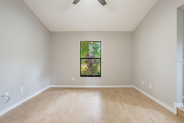 8410 Lake Bosse Dr, Orlando, FL 32810 - empty room with light wood-type flooring, a ceiling fan, and baseboards