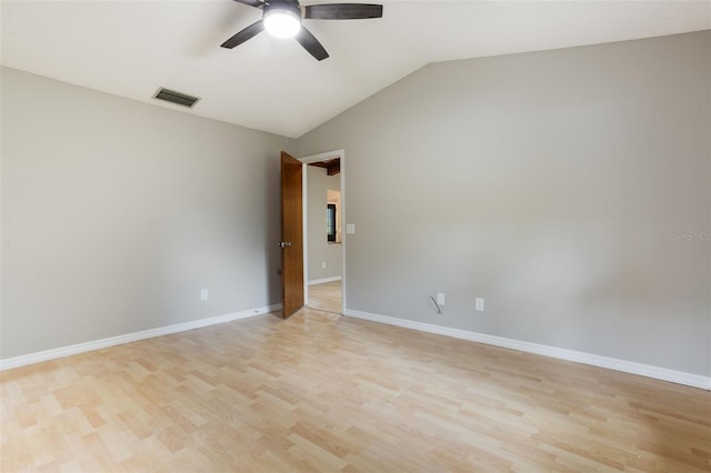 8410 Lake Bosse Dr, Orlando, FL 32810 - unfurnished room with a ceiling fan, light wood finished floors, lofted ceiling, and baseboards