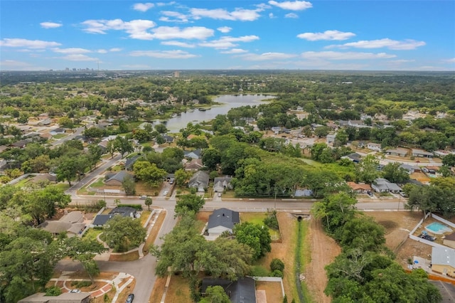 8410 Lake Bosse Dr, Orlando, FL 32810 - aerial overview of property's location featuring a nearby body of water and nearby suburban area