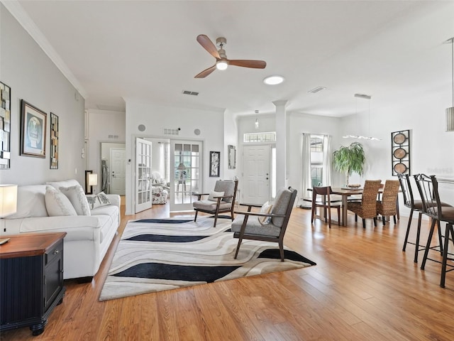 11820 SE 178th St, Summerfield, FL 34491 - living room with a ceiling fan and light wood-style floors