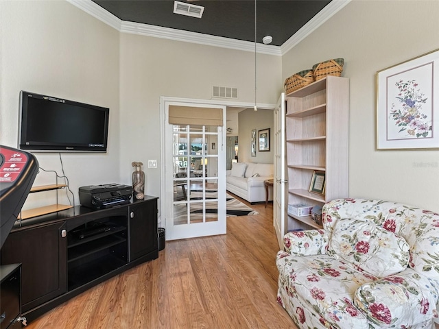 11820 SE 178th St, Summerfield, FL 34491 - living area with ornamental molding and light wood-style flooring