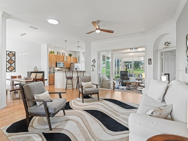 11820 SE 178th St, Summerfield, FL 34491 - living area featuring ceiling fan, light wood-style floors, crown molding, and recessed lighting