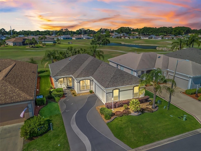 11820 SE 178th St, Summerfield, FL 34491 - aerial view at dusk of a residential view, a water view, and view of golf course