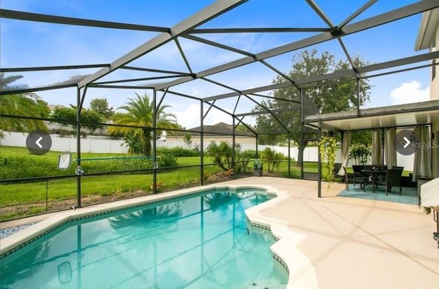 356 Giovani Blvd, Clermont, FL 34715 - swimming pool featuring a patio and glass enclosure