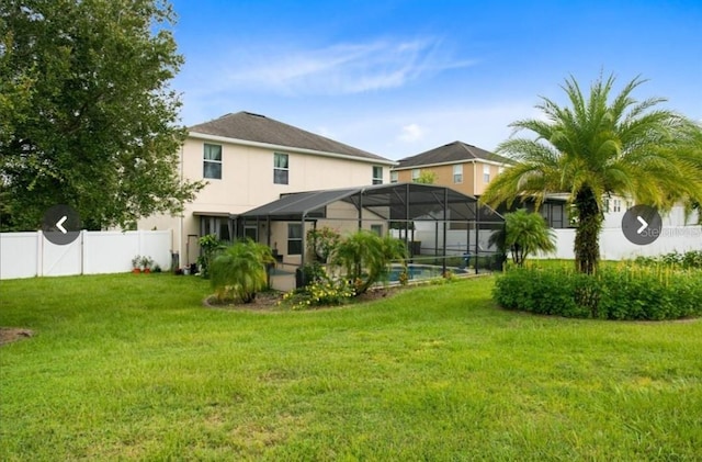 356 Giovani Blvd, Clermont, FL 34715 - back of house featuring stucco siding and a lanai