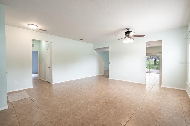 356 Giovani Blvd, Clermont, FL 34715 - spare room with a ceiling fan and light tile patterned floors