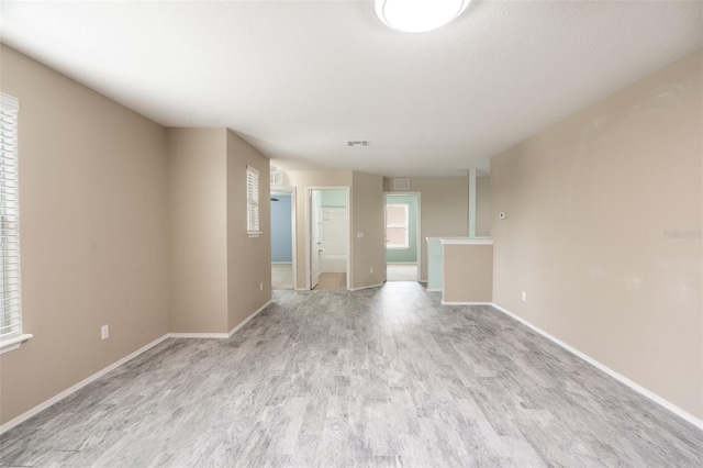 356 Giovani Blvd, Clermont, FL 34715 - empty room with light wood-style floors and baseboards
