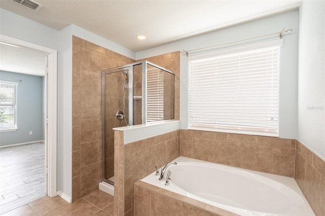 356 Giovani Blvd, Clermont, FL 34715 - full bath with a garden tub, a shower stall, tile patterned floors, and recessed lighting