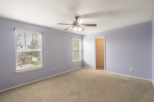 356 Giovani Blvd, Clermont, FL 34715 - empty room featuring a ceiling fan and light colored carpet