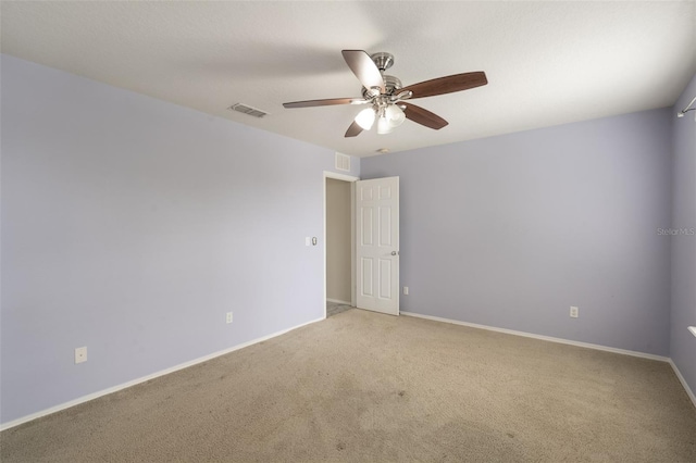 356 Giovani Blvd, Clermont, FL 34715 - empty room with a ceiling fan and light colored carpet